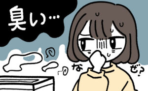 加湿器から漂う悪臭に鼻をつまむ女性