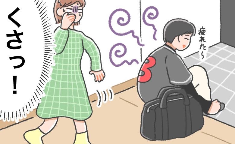 野球から帰宅した夫の強烈なにおいに顔をしかめる妻のイラスト